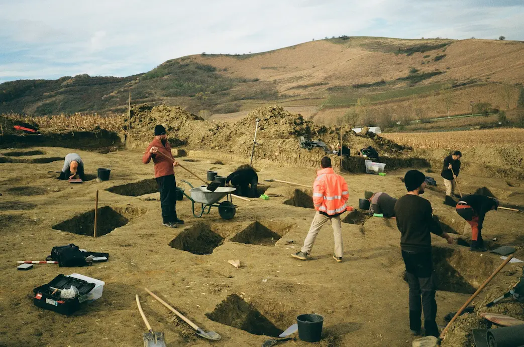 Preliminary site assessment and its importance — workers excavating trial pits during early stage ground investigation